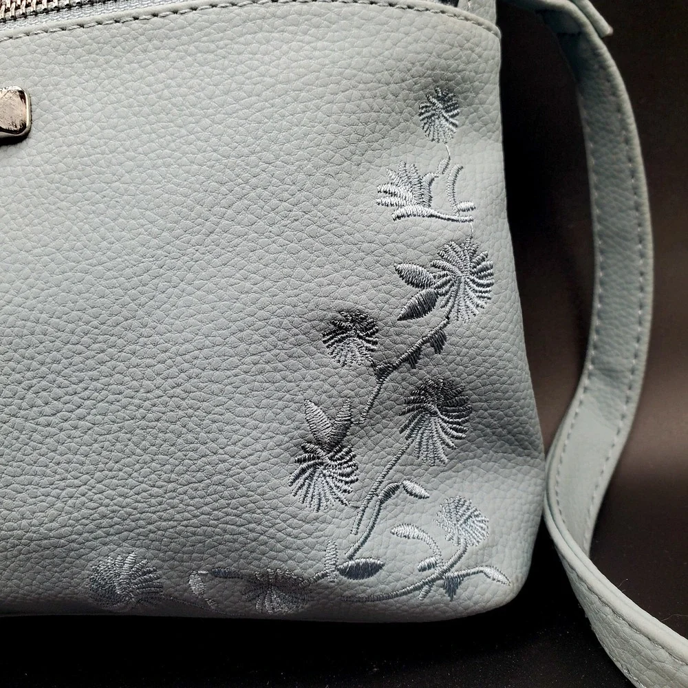 Rosetti Purse Baby Blue W/ Embroidered Flowers & Adjustable Strap. 9